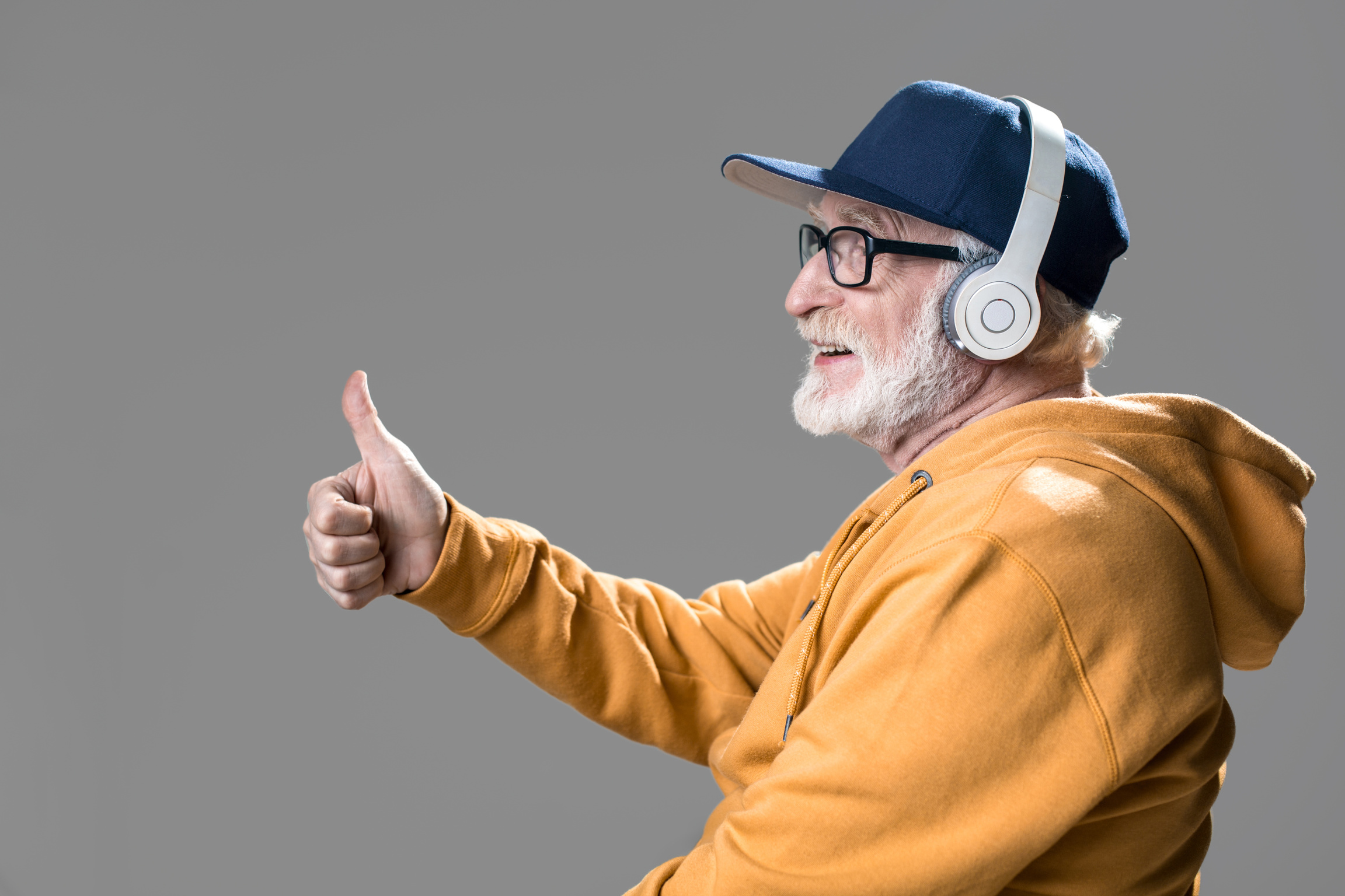 Cheerful male person listen to music